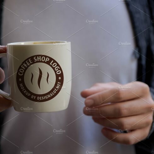 Man Holding Coffee Mug Mockup #2 cover image.