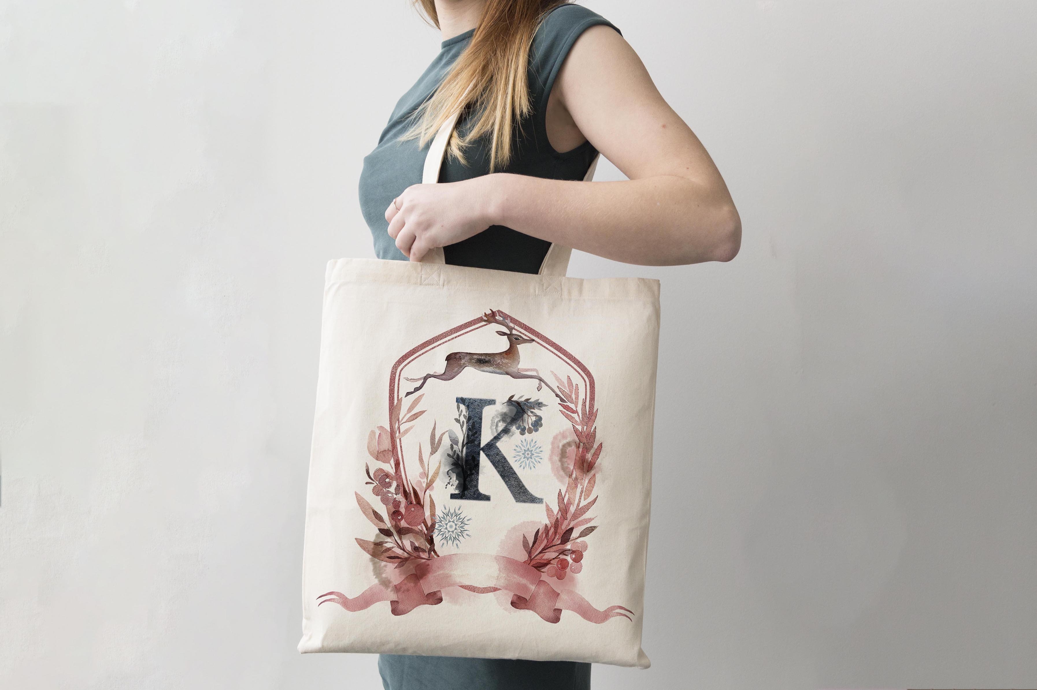 Woman holding tote bag mockup preview image.