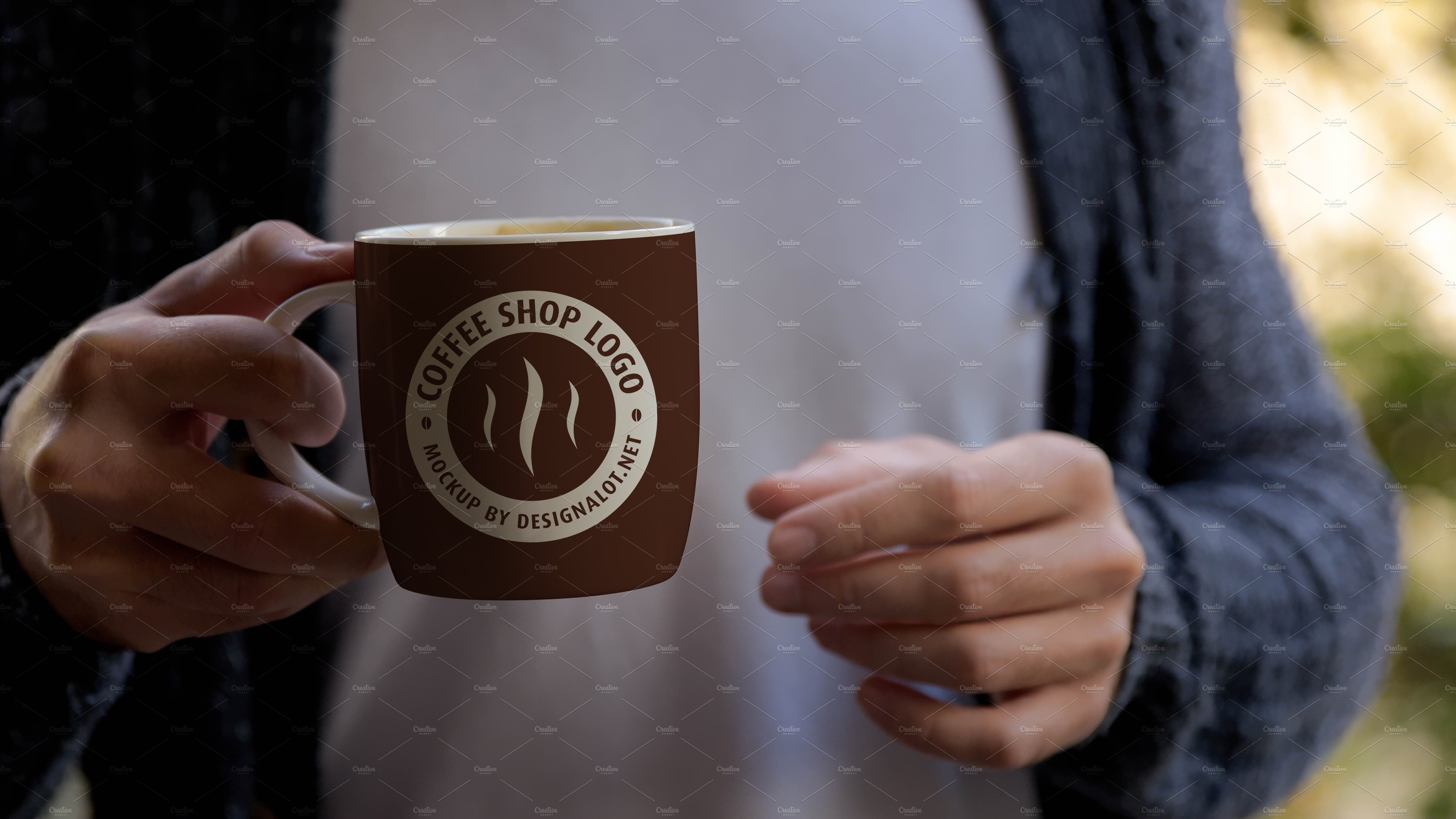 Man Holding Coffee Mug Mockup #2 preview image.