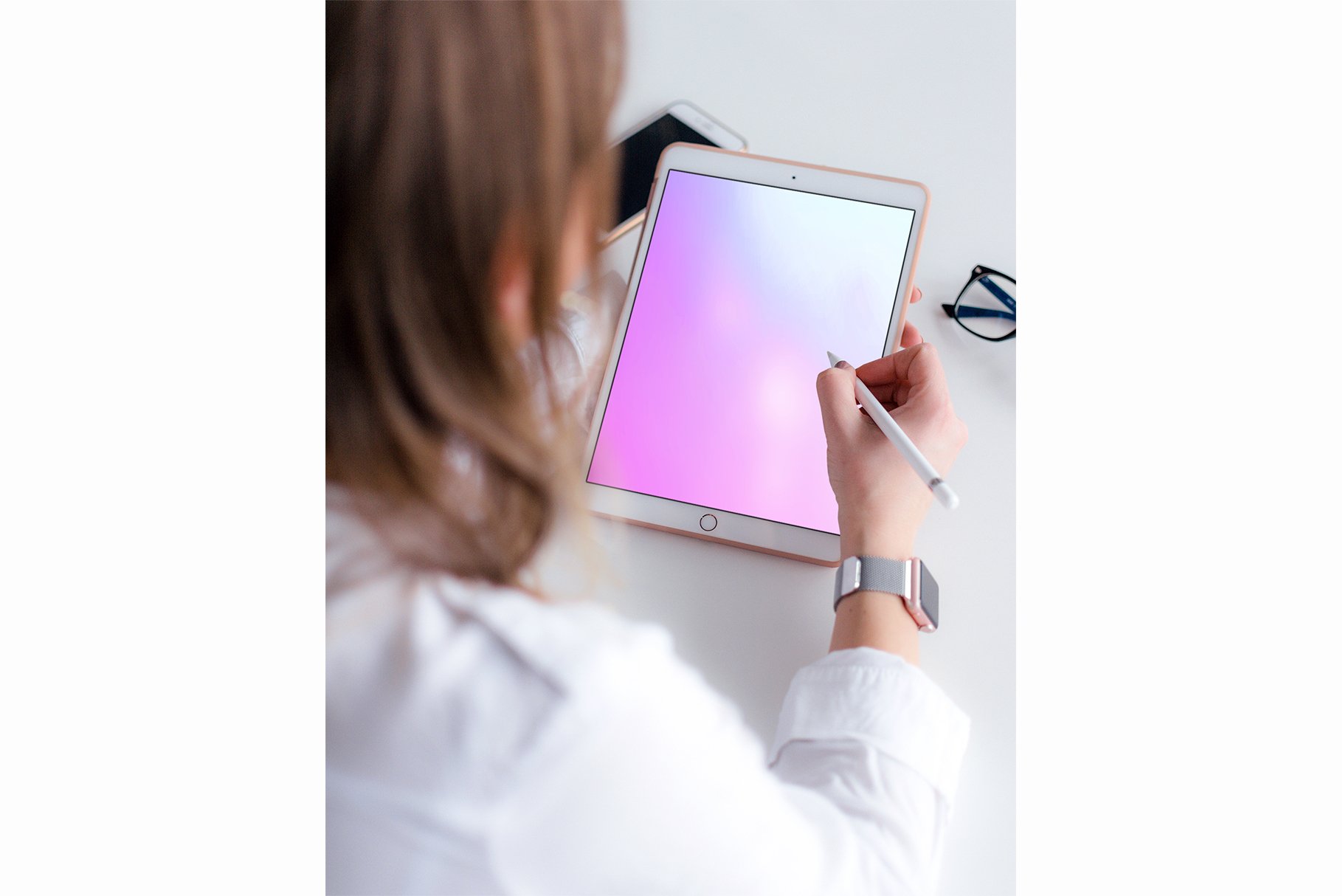 Person Holding iPad Mockup Bundle preview image.