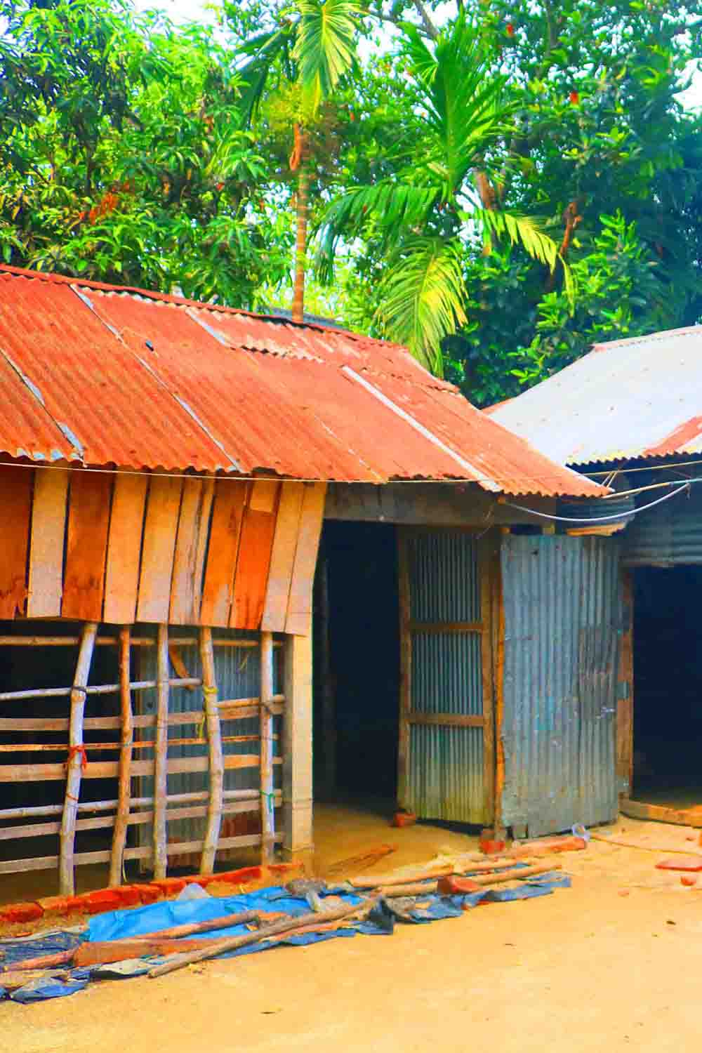 Ghar Tree village people & roads stock photos in Bangladesh pinterest preview image.