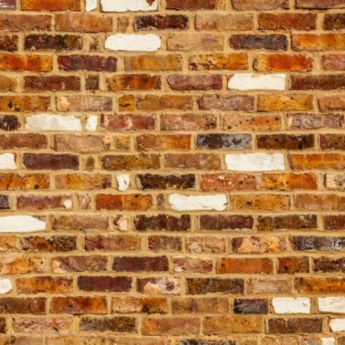 Red & orange brick wall background cover image.