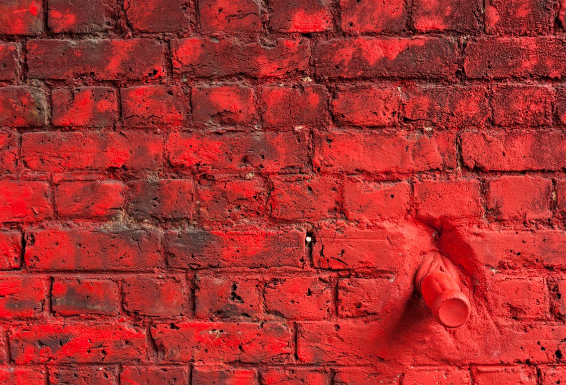 Red brick wall background cover image.