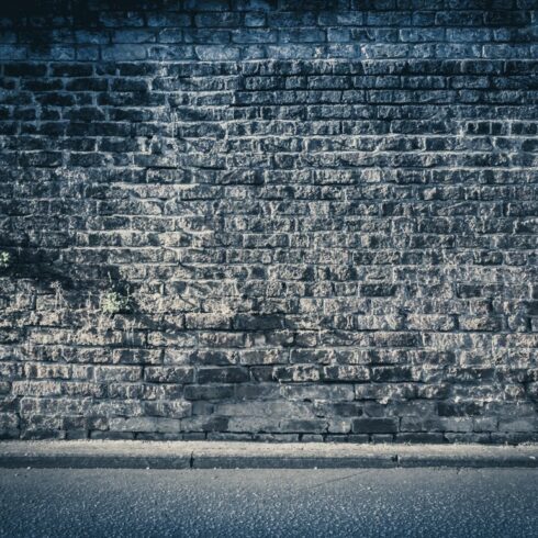 Brickwall background - dark blue cover image.