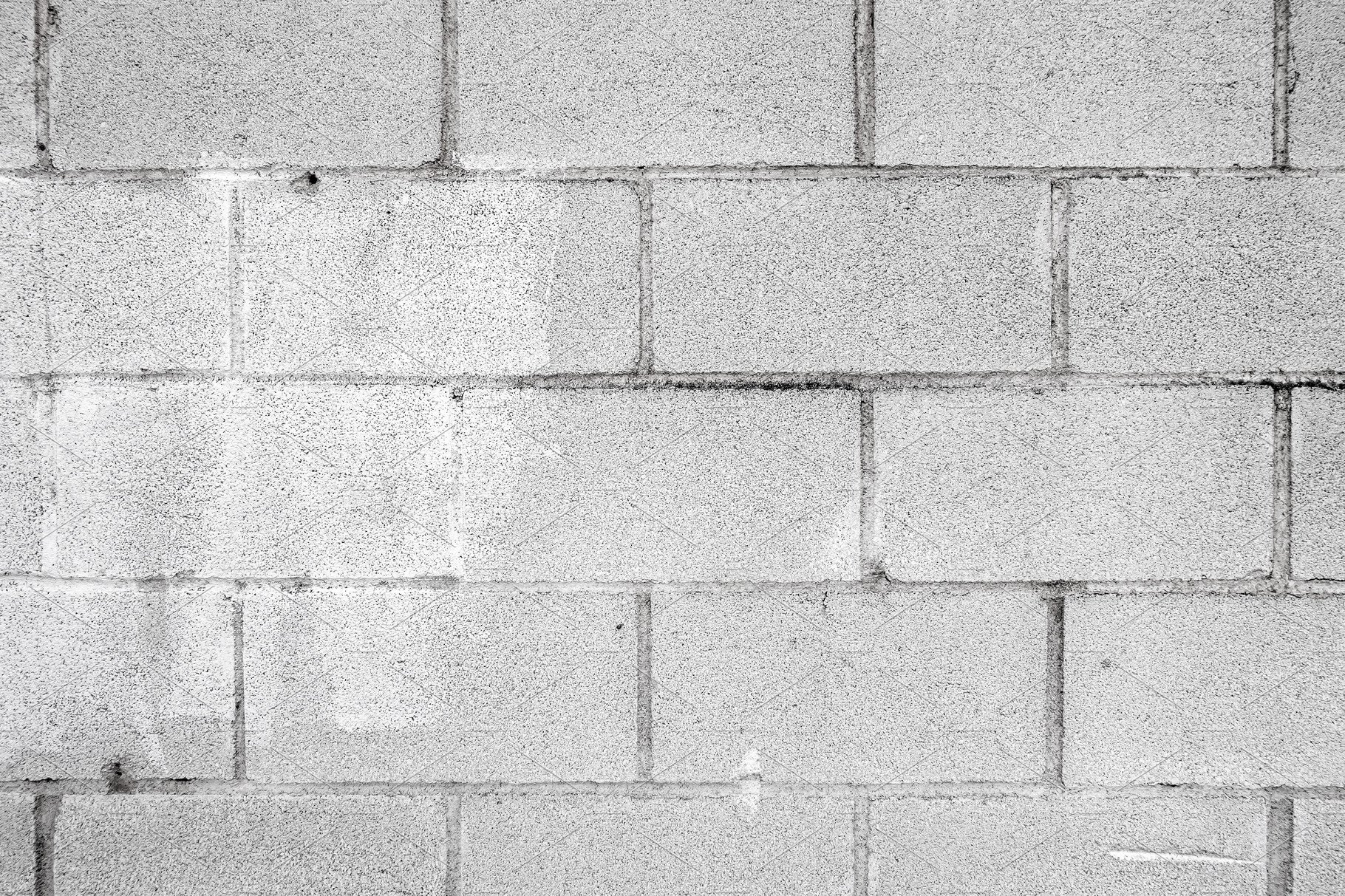 Cinder block wall background texture cover image.