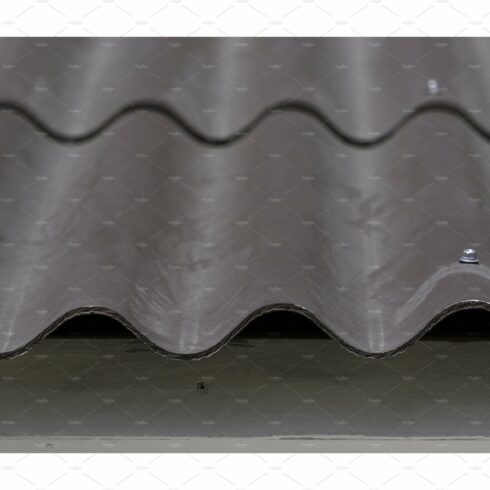 Close-up of roof tiles at home cover image.