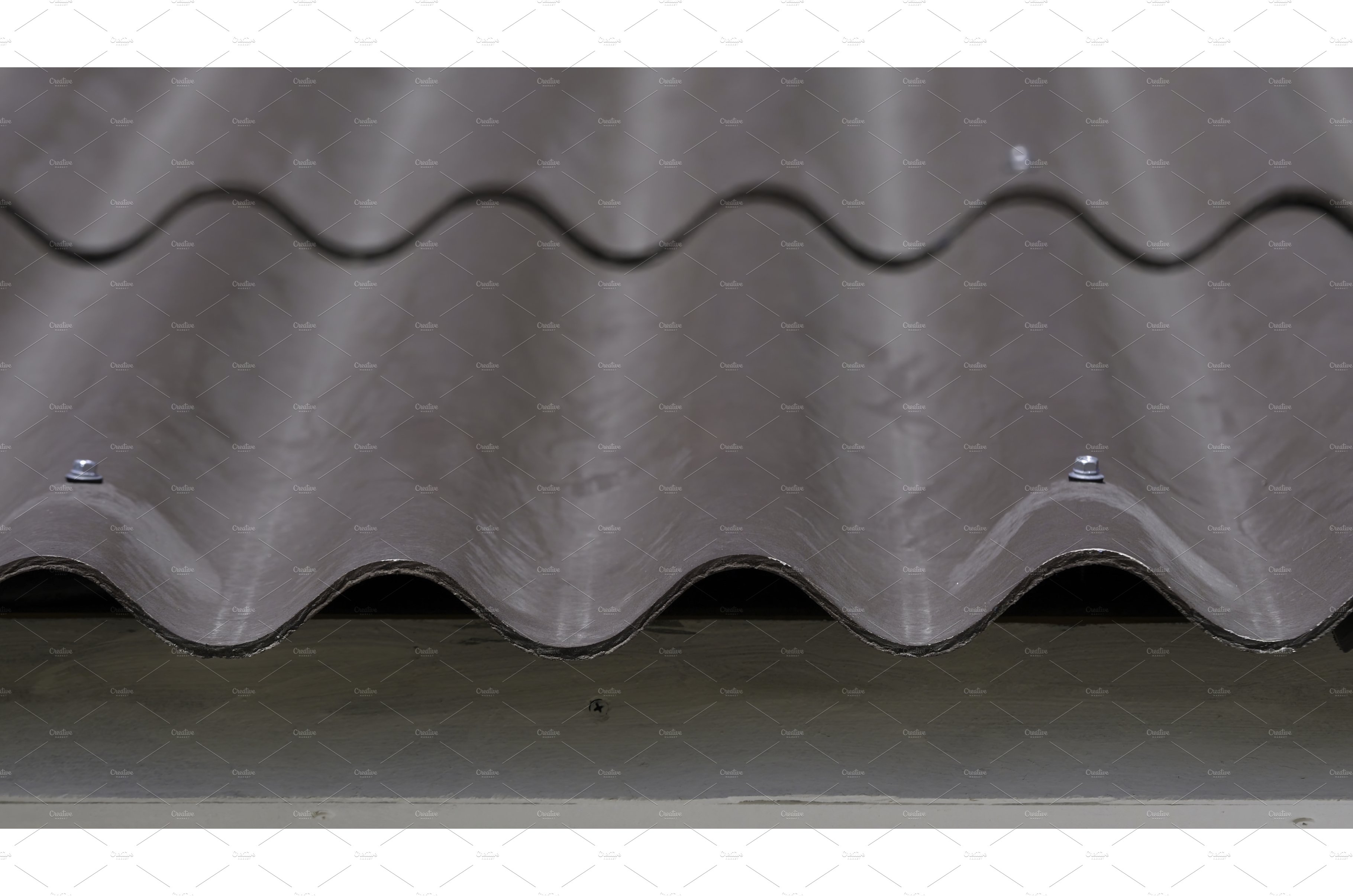 Close-up of roof tiles at home cover image.