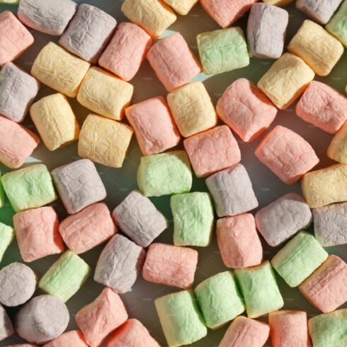 Multicolored marshmallows blue cover image.