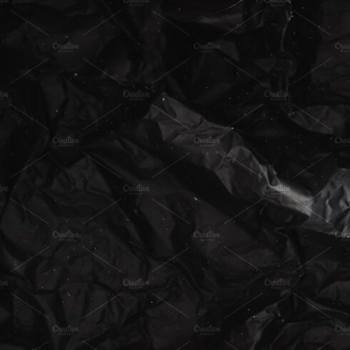 black foil background crumpled cover image.