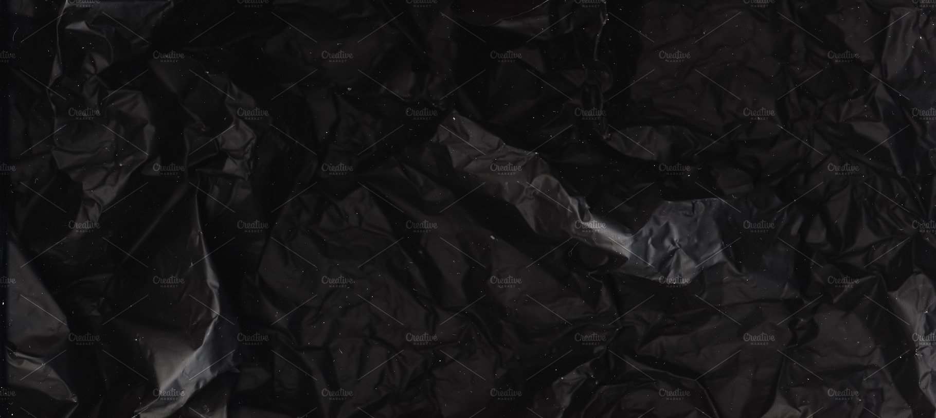 black foil background crumpled cover image.