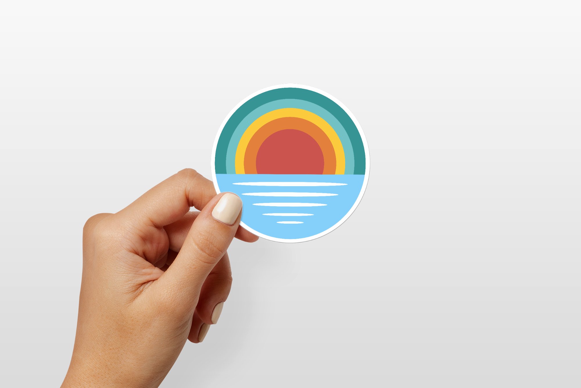 hand holding round sticker mockup 2000x1334 340