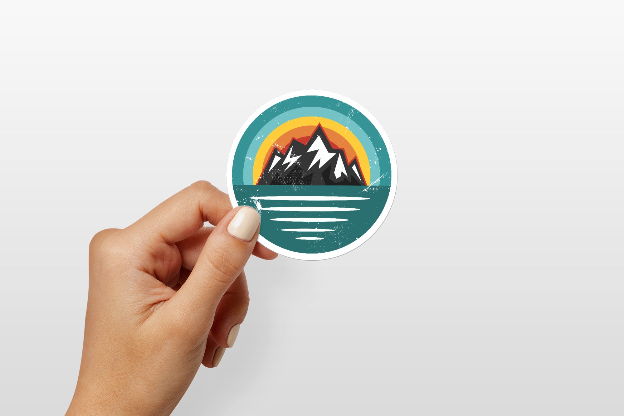 hand holding round sticker mockup 2000x1334 70