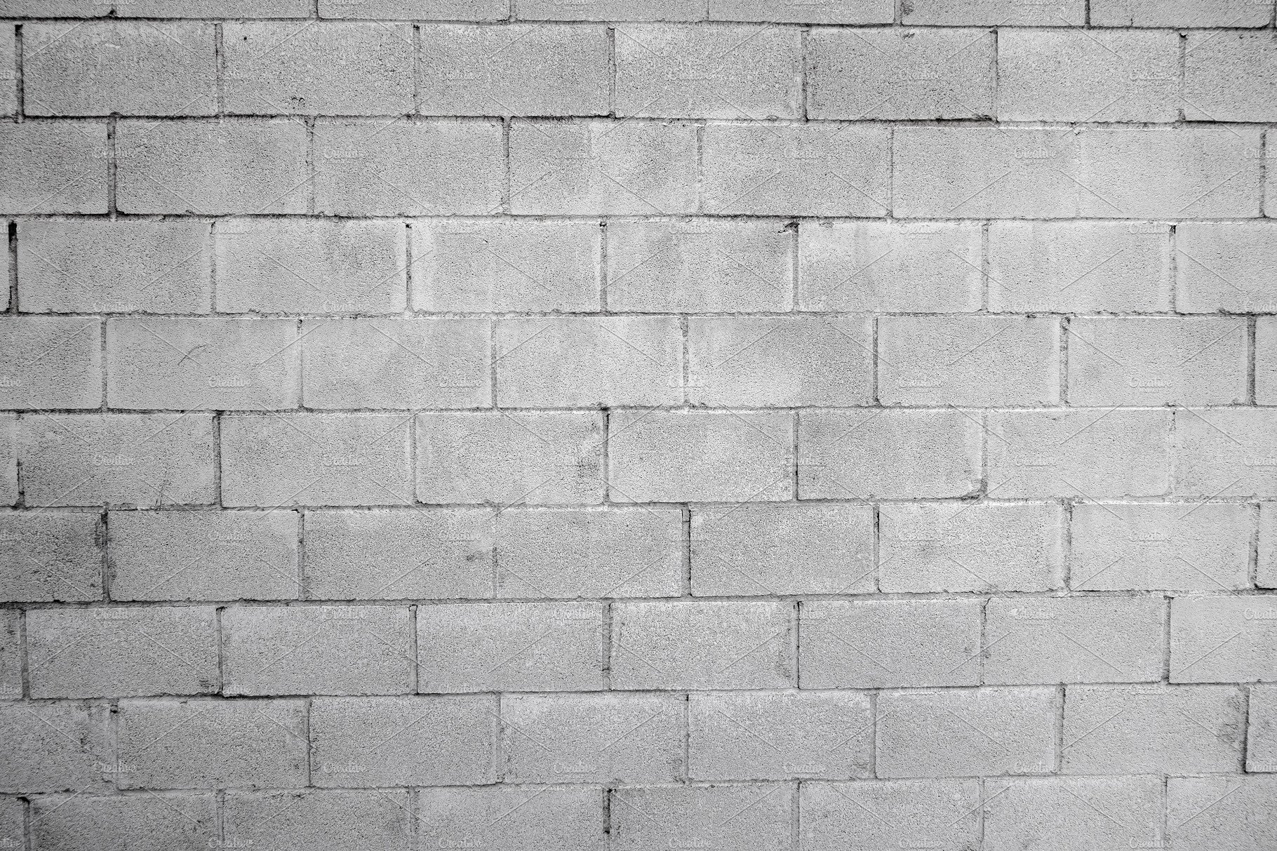 Cinder block wall background texture cover image.