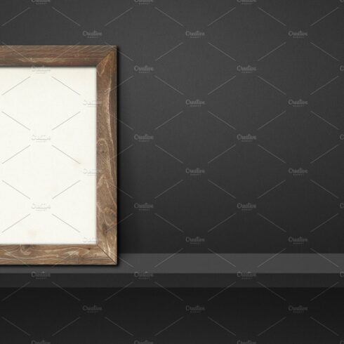 Wooden picture frame leaning on a black shelf. 3d illustration. cover image.