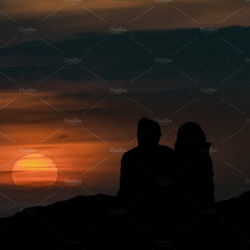 Couple Silhouette Watching the View cover image.