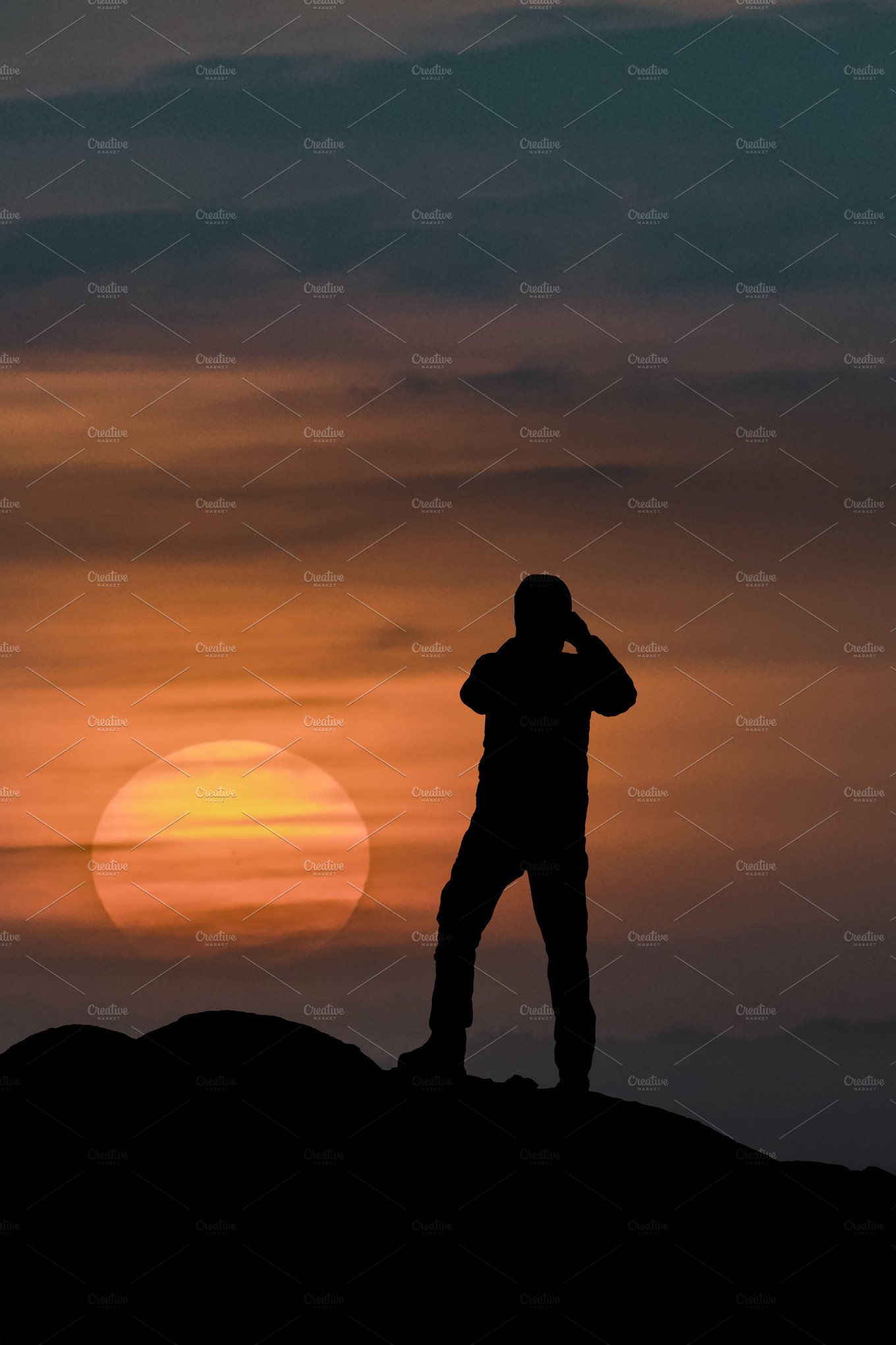 Man Taking Photos at Sunset cover image.