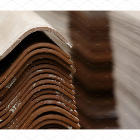 Stack red roof tiles, raw material cover image.