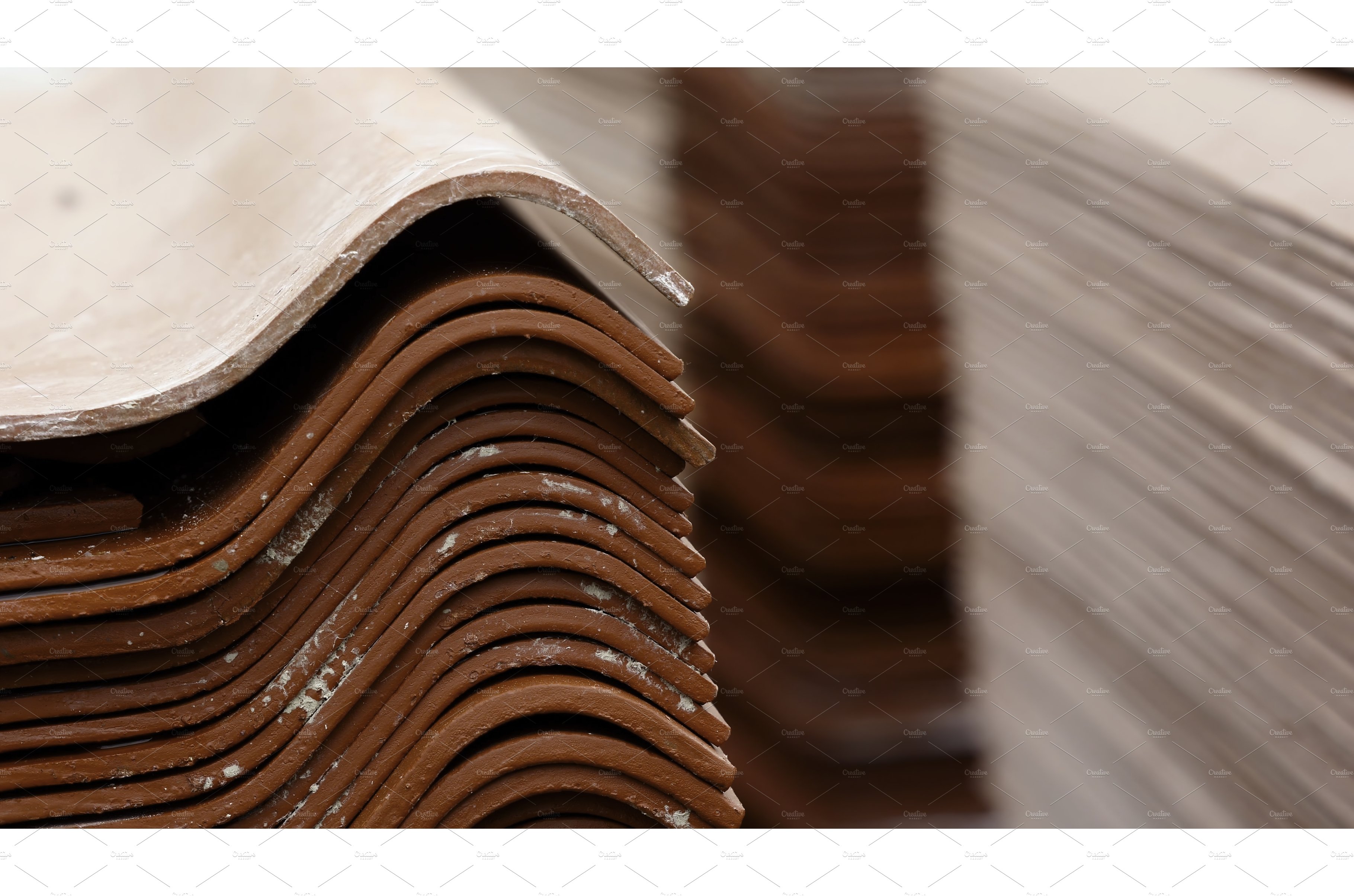 Stack red roof tiles, raw material cover image.