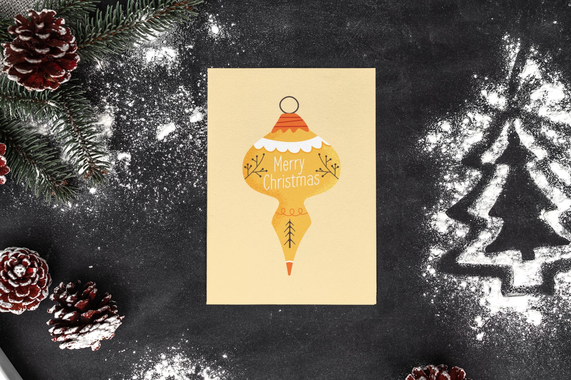 christmas mockup of a postcard lying by pine cones with christmas toy flat design 259