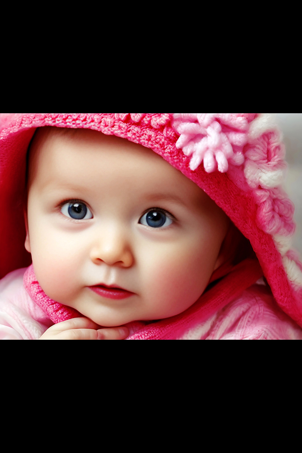Portrait Of Adorable Baby Girl Wearing Pink Dress v1 pinterest preview image.
