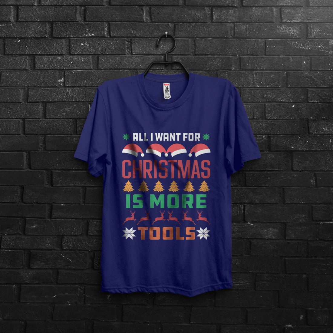 All I want for Christmas is more tools t-shirt design preview image.