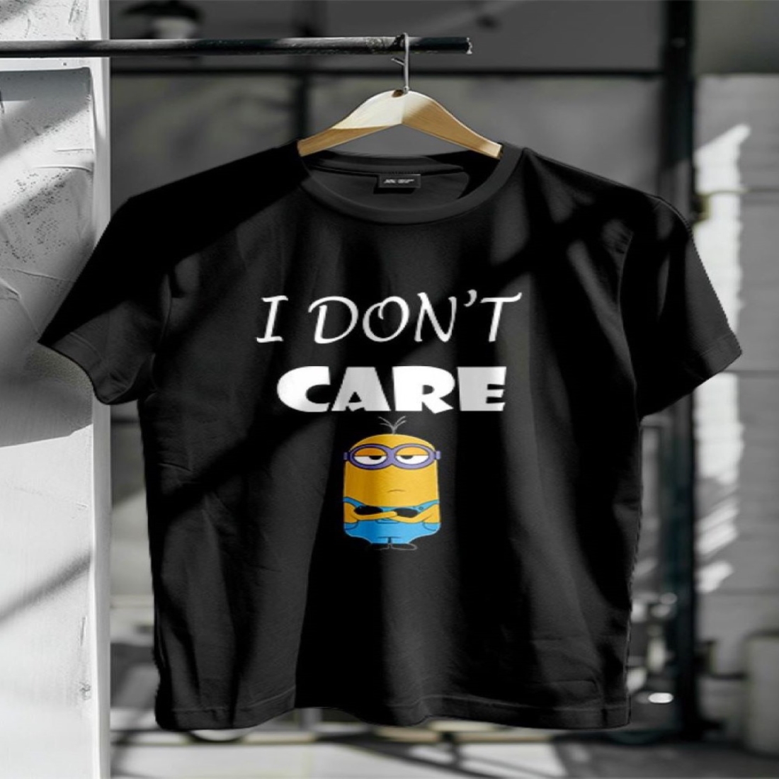 I Don't Care Minion T-shirt design preview image.