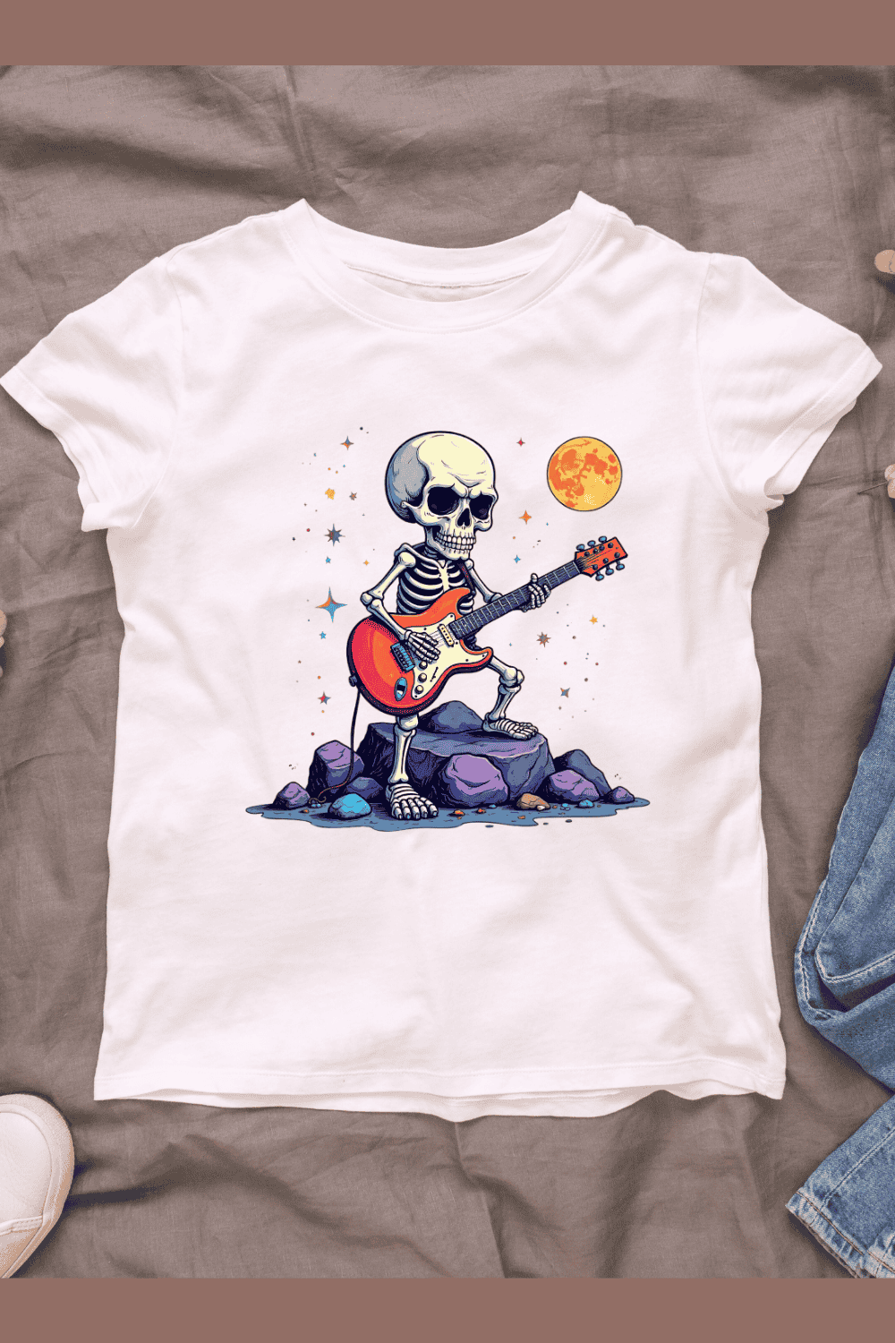 Skeleton Playing Electric Guitar on Rocks T-Shirt Design Bundle pinterest preview image.