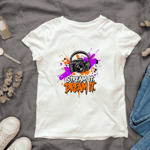 Colorful Graffiti-Style Camera and Headphones T-Shirt Design cover image.