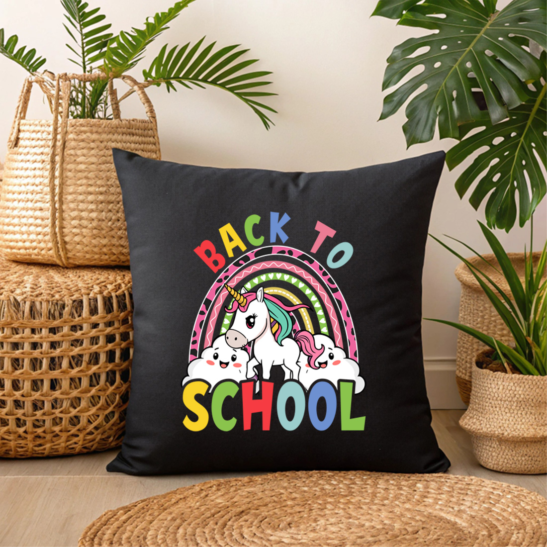 cute unicorn back to school design with colorful rainbow and happy clouds 3 black pillow mock up 945