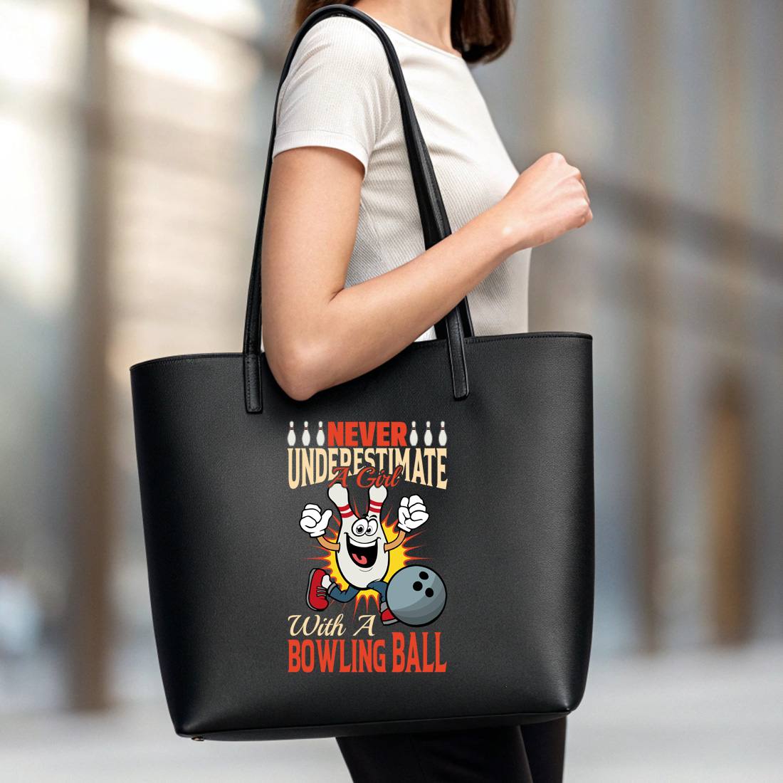 never underestimate a girl with a bowling ball 6 black tote beg mock up 267