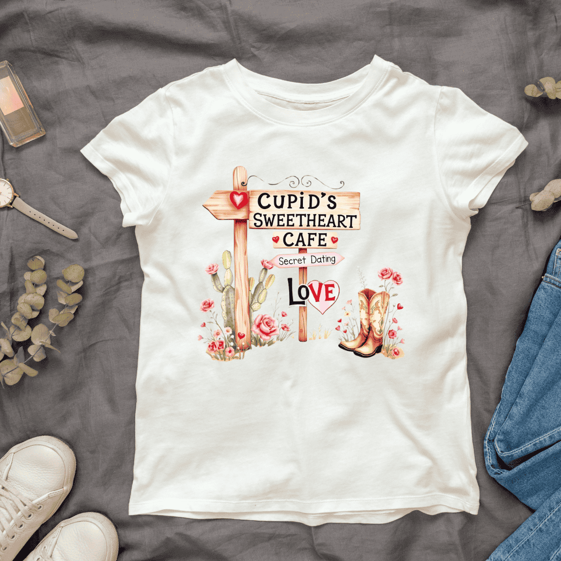 Cupid's Sweetheart Cafe Sign with Cactus and Roses T-shirt Design cover image.