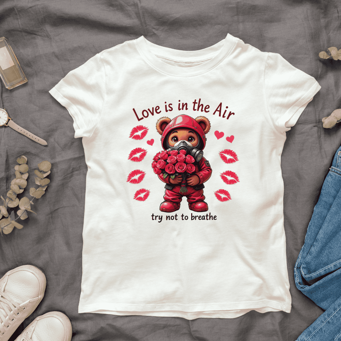 Teddy Bear with Gas Mask, Roses, and Love is in the Air Quote T-shirt Design cover image.