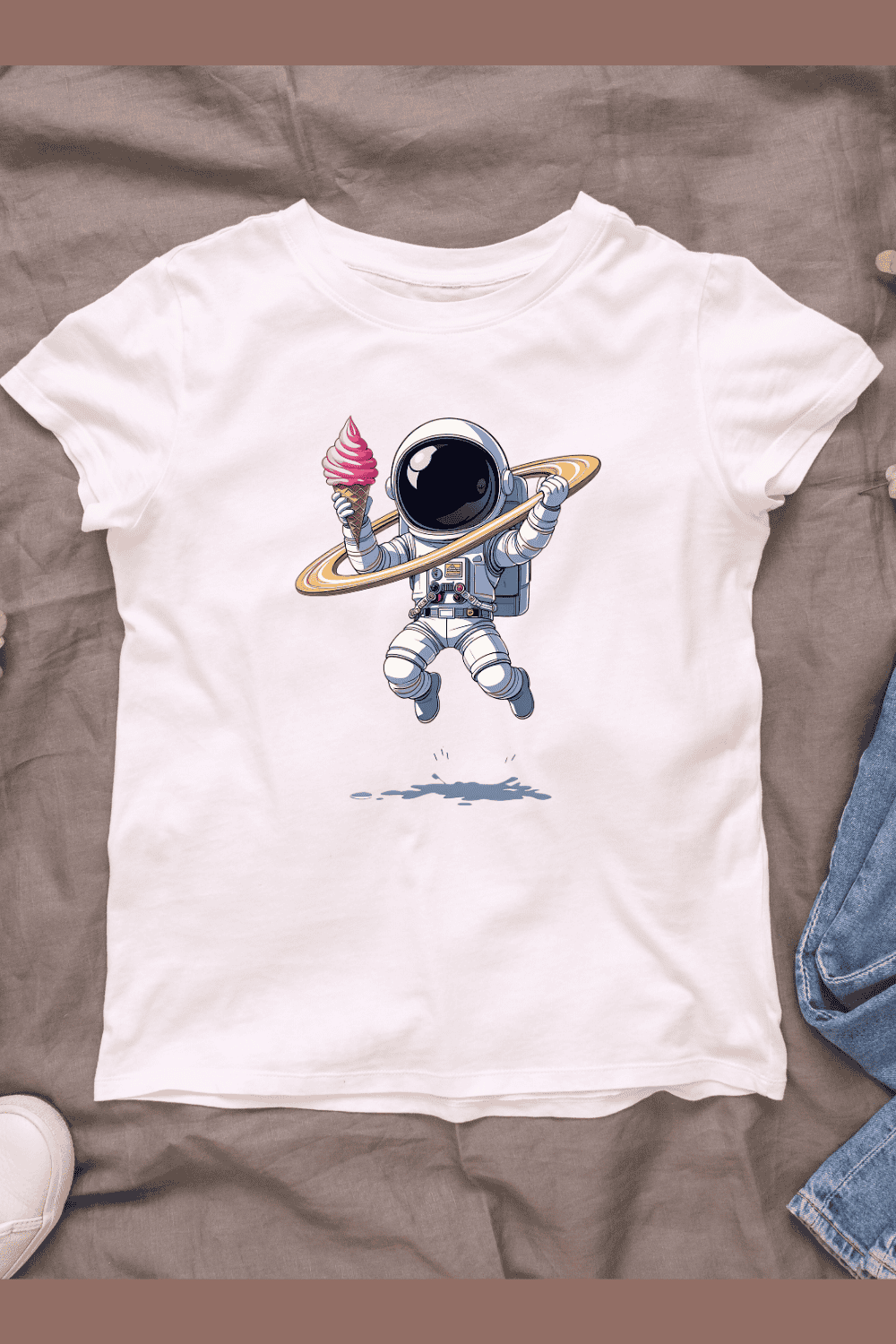 Cute cartoon astronaut with giant ice cream cone and Saturn rings T-Shirt Design pinterest preview image.