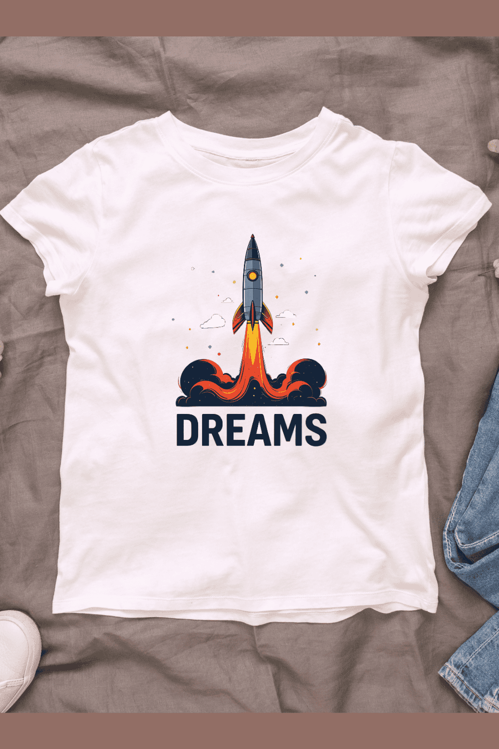 Retro rocket ship with white text DREAMS T-shirt Design pinterest preview image.