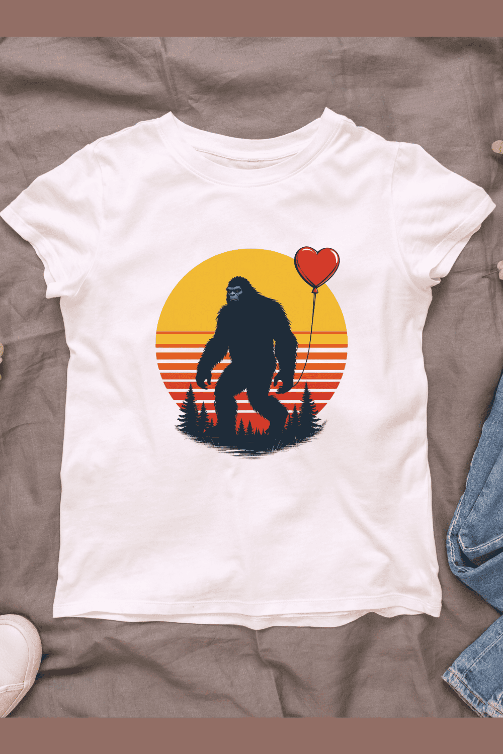 Retro sunset bigfoot with heart-shaped balloon T-shirt Design pinterest preview image.