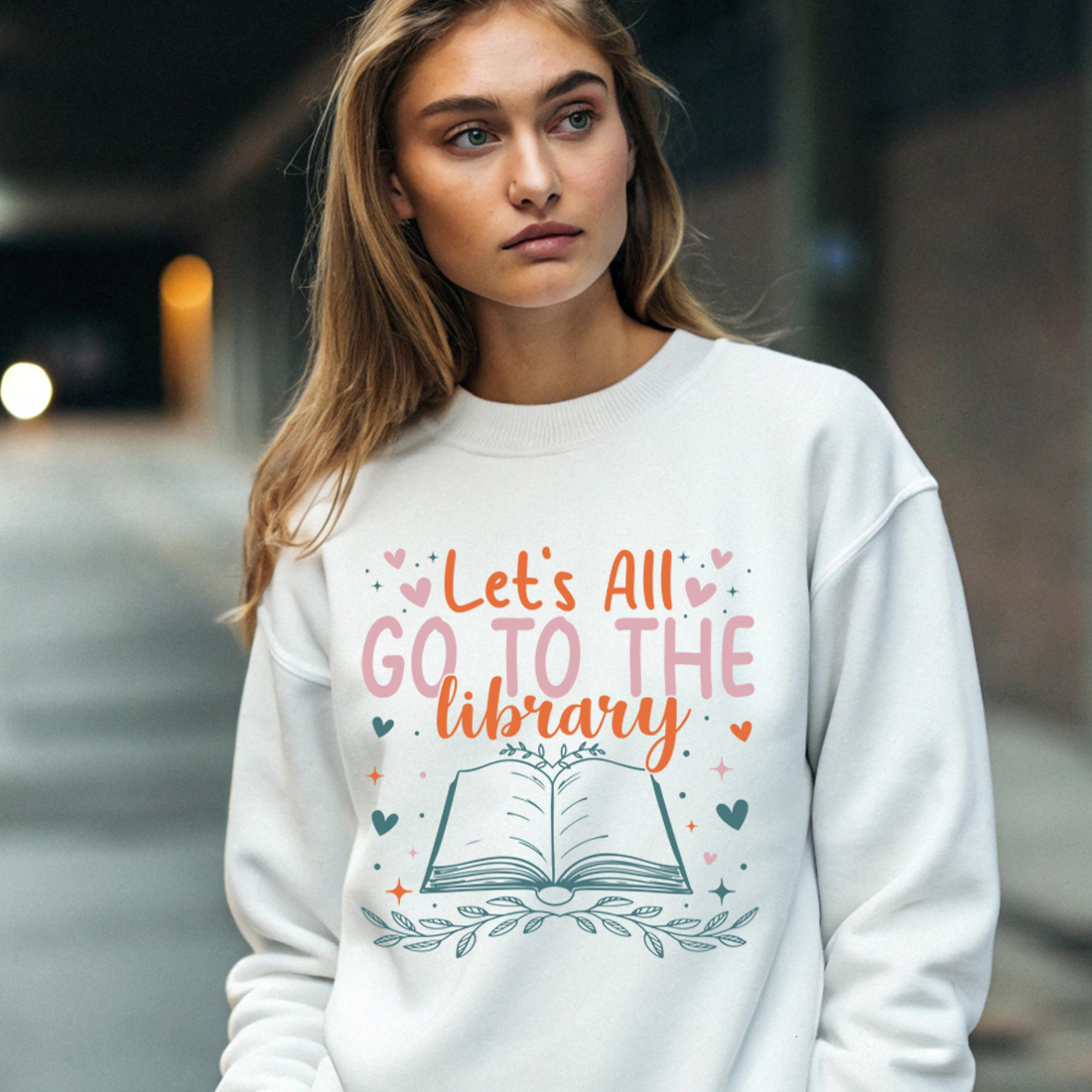 cute book lover t shirt design with typography lets all go to the library and open book illustration 4 with female sweatshirt mock up 275