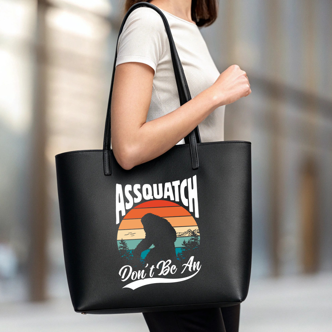 funny retro bigfoot silhouette t shirt design with vintage sunset background 6 black tote beg mock up 928