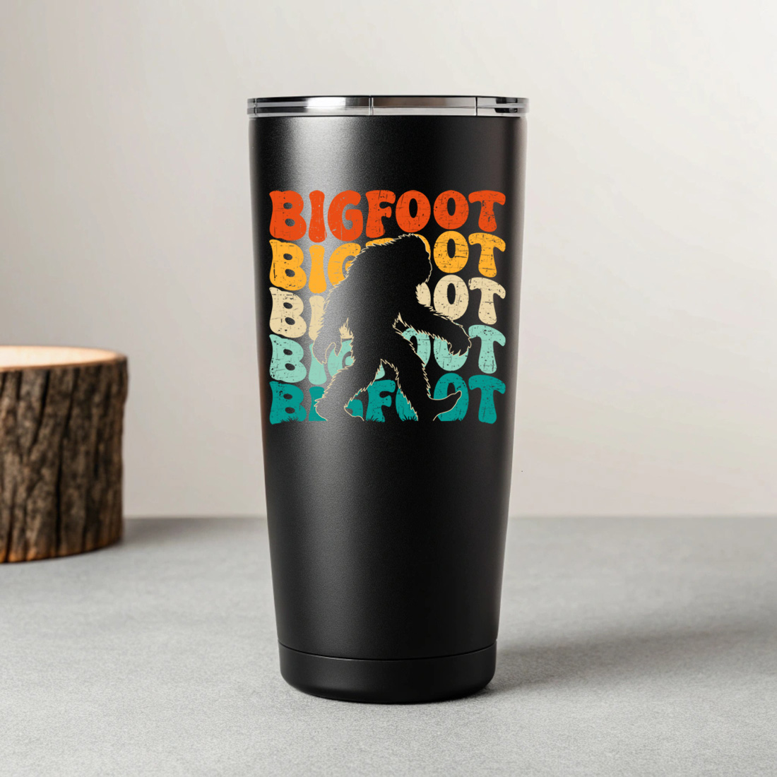 retro bigfoot t shirt design with vintage typography for outdoor and adventure lovers 7 black tumblers mockup 805