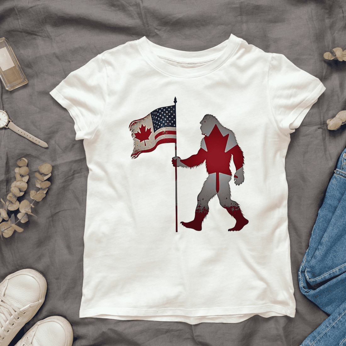 Bigfoot Holding American and Canadian Flag T-shirt Design cover image.