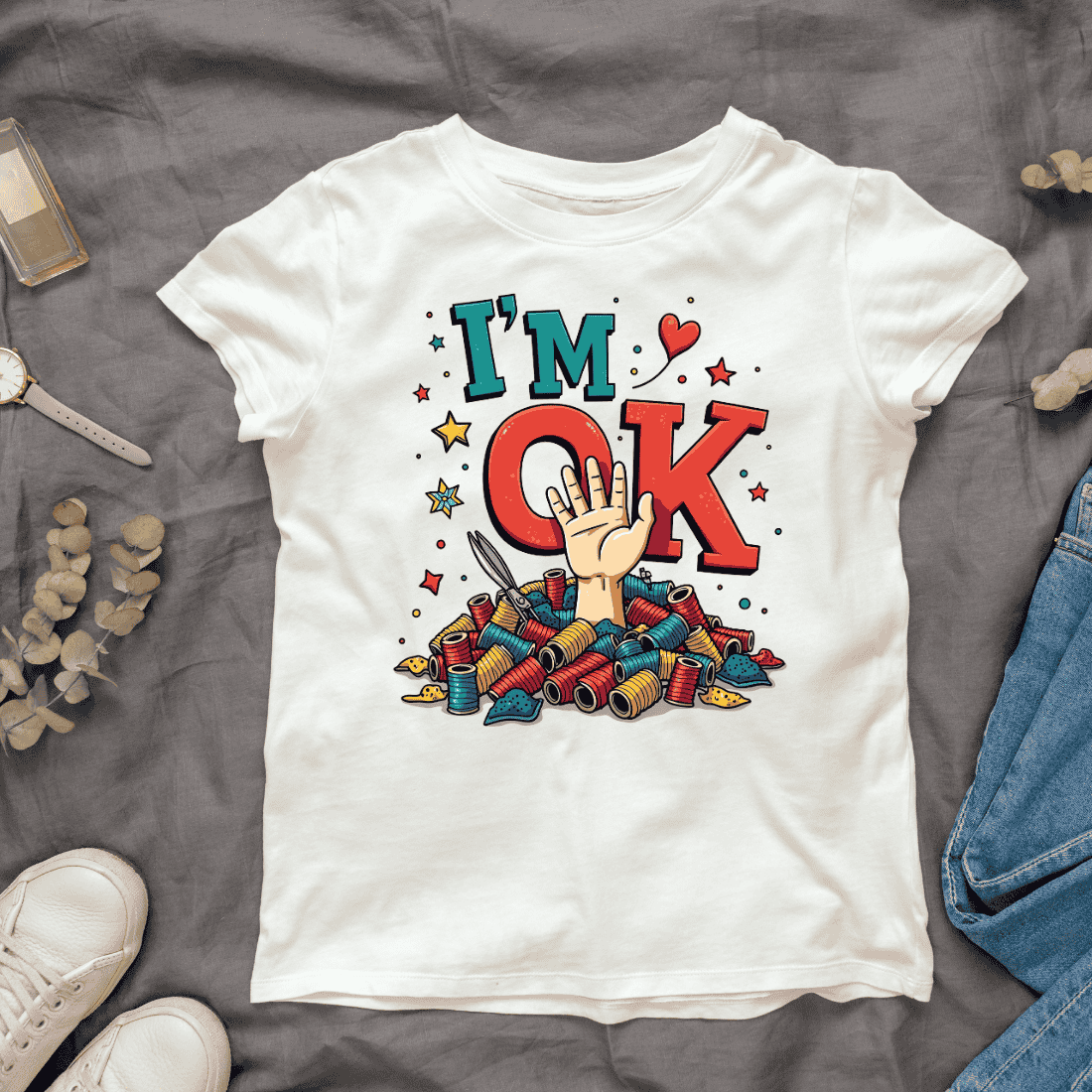 I'm OK - Hand Reaching from Spools of Thread T-shirt Design cover image.