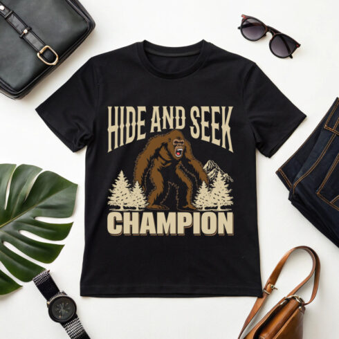 Trendy hide and seek champion bigfoot graphic for t-shirts and merchandise cover image.