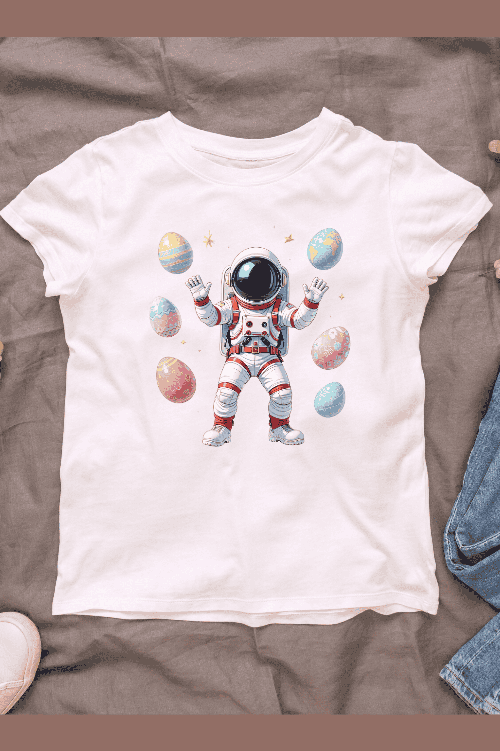 Cute astronaut With Colorful Eggs T-shirt Design pinterest preview image.