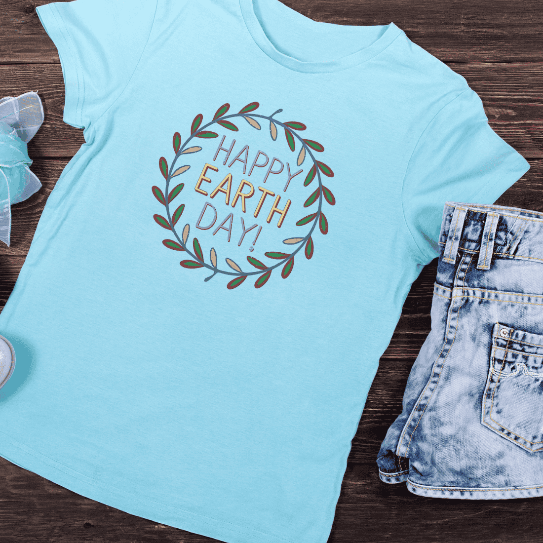 Earth Day Leaf Wreath with Typography T-shirt Design preview image.