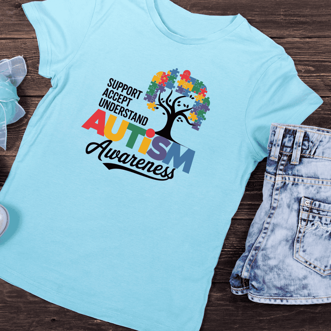 Autism Awareness Tree with Puzzle Pieces T-Shirt Design preview image.