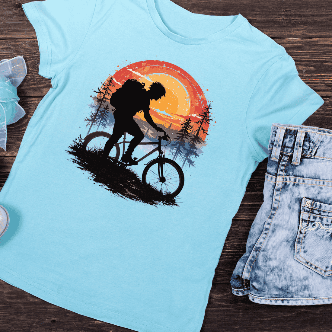 Mountain Biker Silhouette Sunset T-shirt Design preview image.