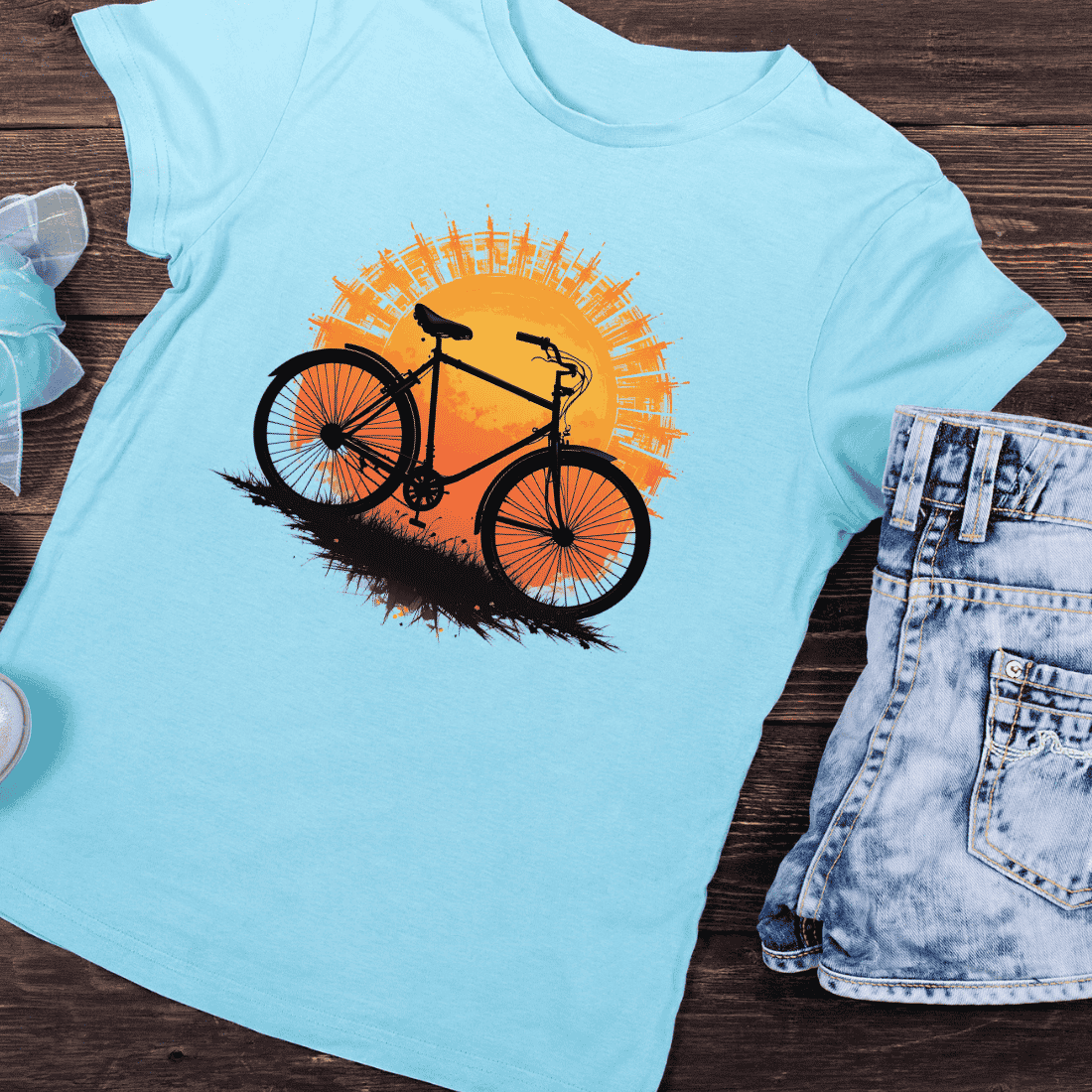 Bicycle Sunset Cityscape T-shirt Design preview image.