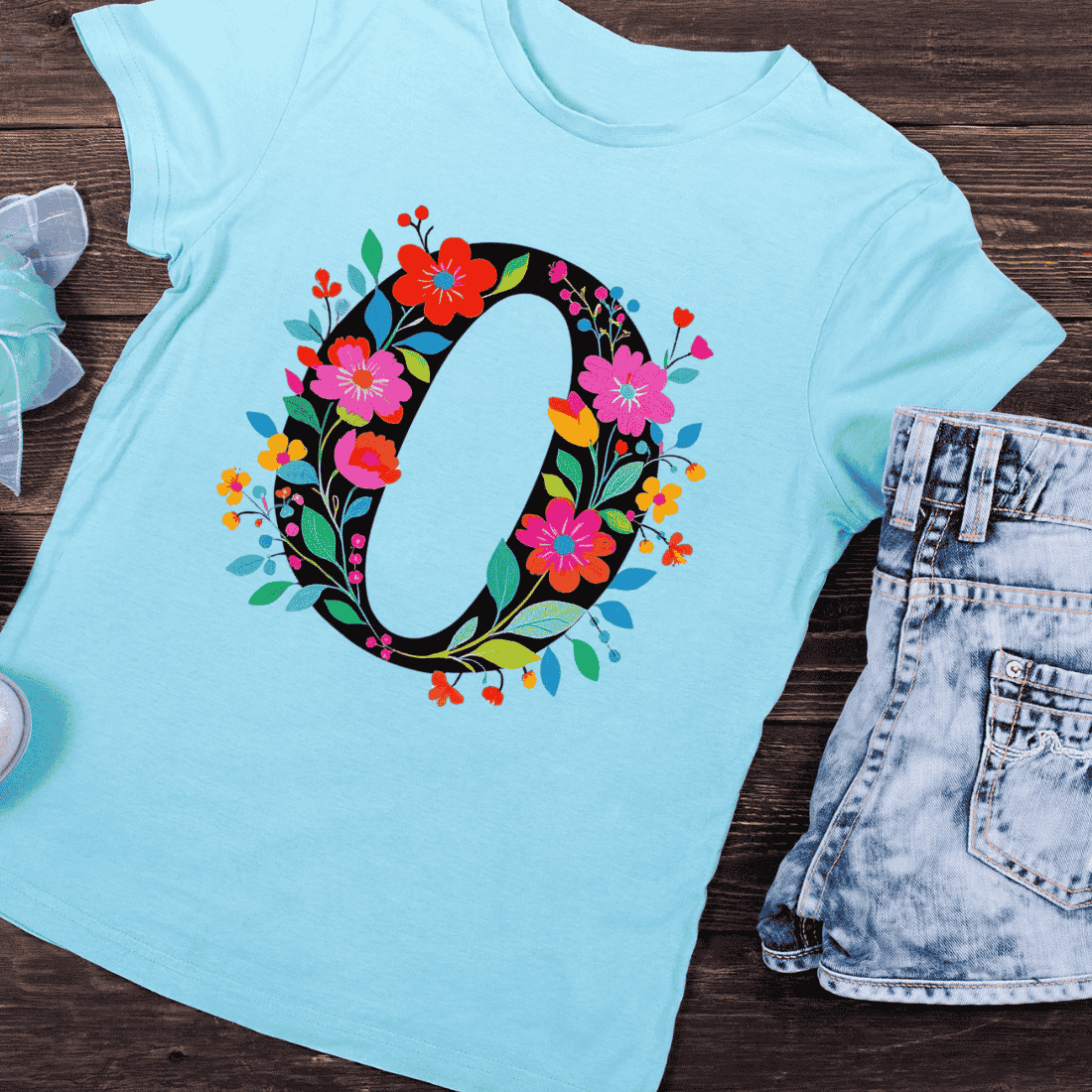 Black Letter O with Colorful Floral Decoration T-Shirt Design preview image.