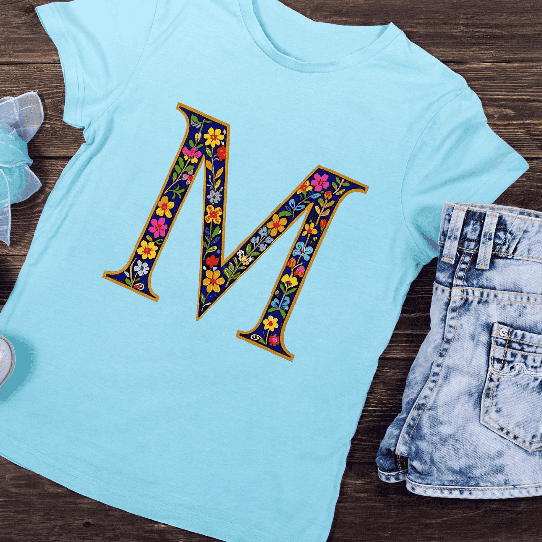 Decorative Alphabet M with Blossoms T-Shirt Design preview image.