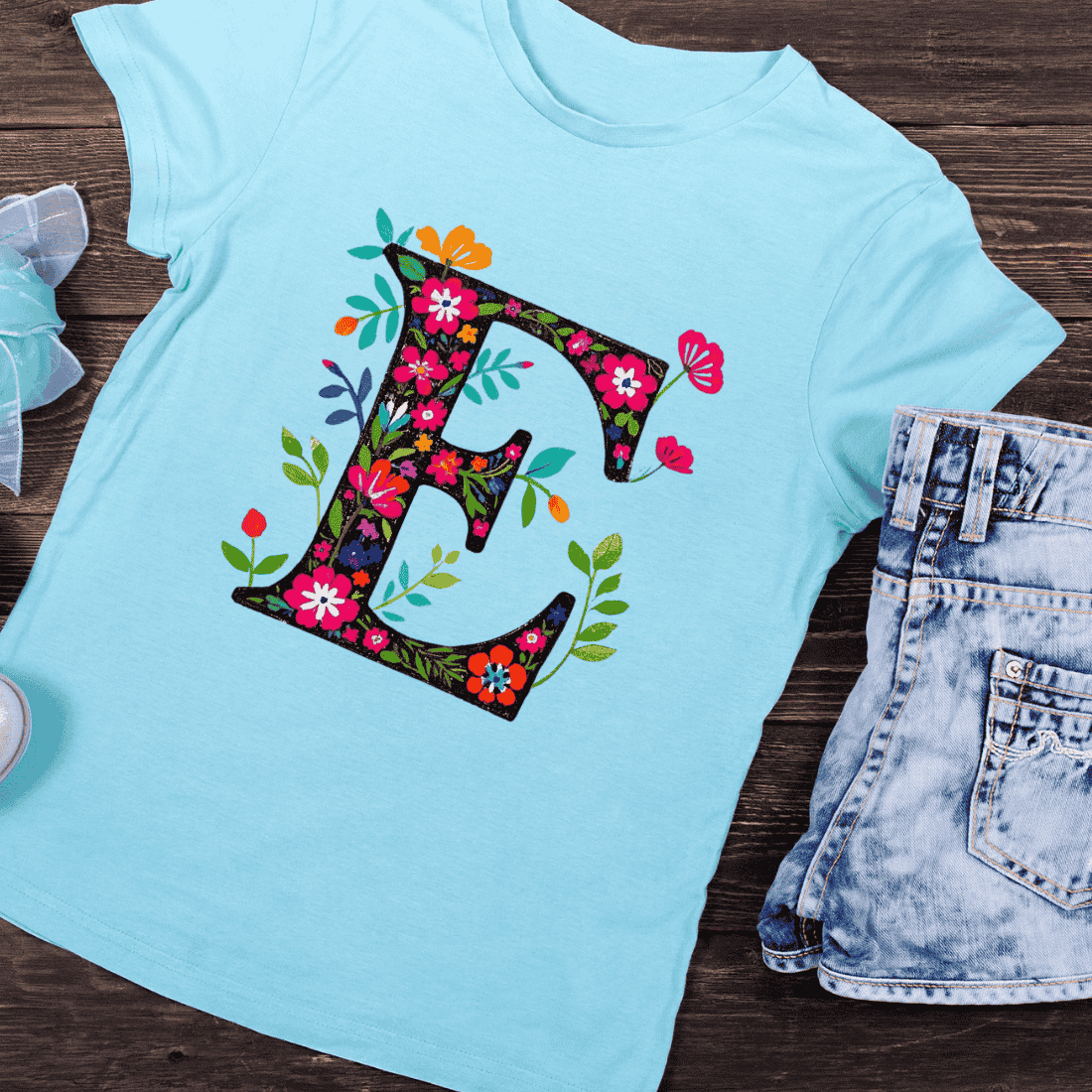 Bold Floral Letter E Vibrant Blooms Alphabet T-Shirt Design preview image.