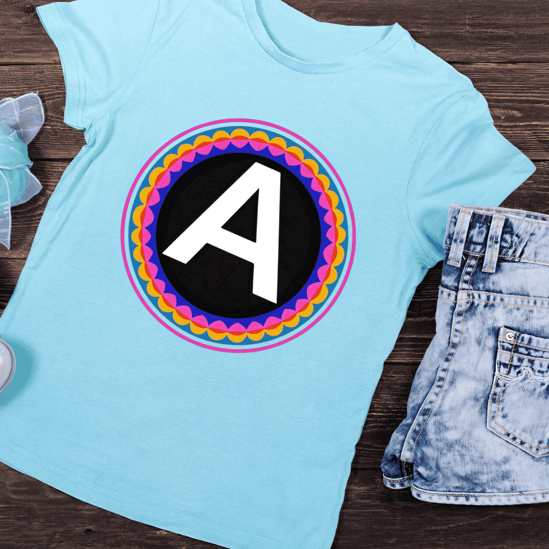 Letter A in Vibrant Geometric Circle Frame T-Shirt Design preview image.